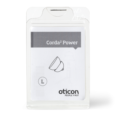 A clear plastic package contains a Corda 2 Power Dome hearing aid accessory, size L. The label shows a product illustration, the Oticon logo, and the text 
